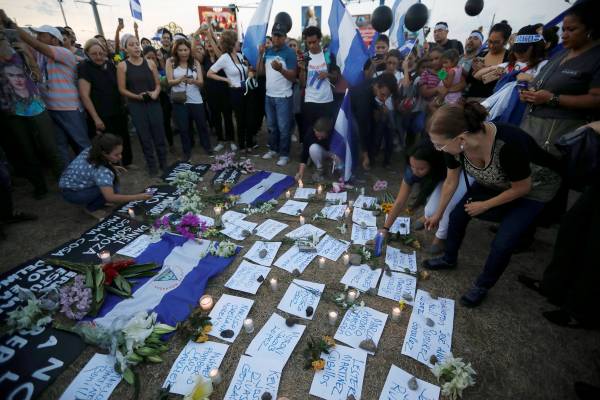People participate in a protest against police violence and the government of Nicaragua's President Daniel Ortega in Managua